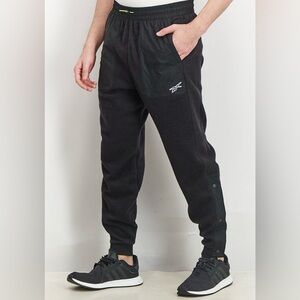 Reebok Fleece Training Calf Snap Track Pants in Black Men’s Medium